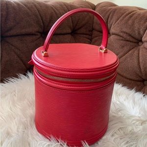 Authentic and Old style Louis Vuitton Cannes Bag in Epi leather.